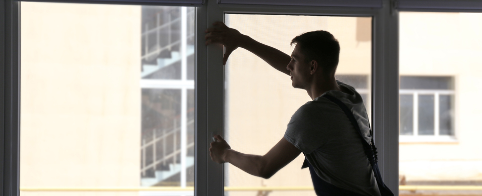 man installing windows